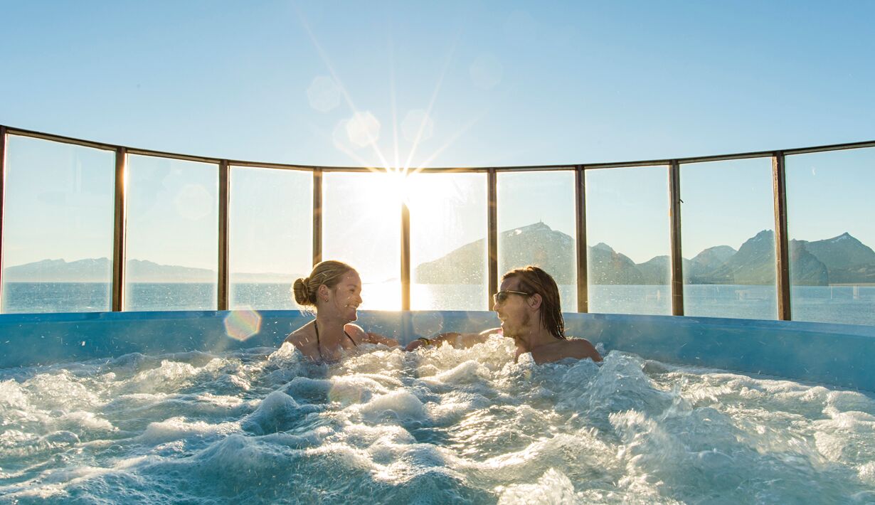 Two ladies in the hot tub on the deck of an antarctic cruise ship.